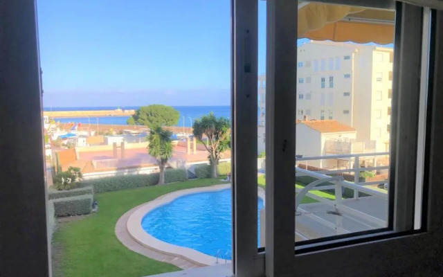 Acogedor apartamento frente al mar con piscina