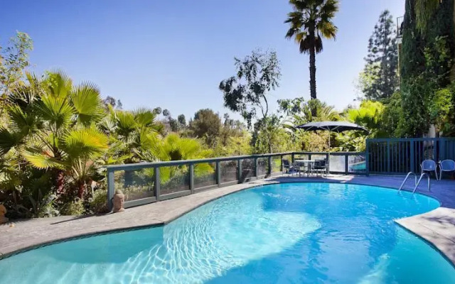 MidCentury Poolview Retreat by LuxPads