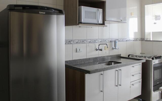 A011 - Apto com churrasqueira e 2 vagas de garagem