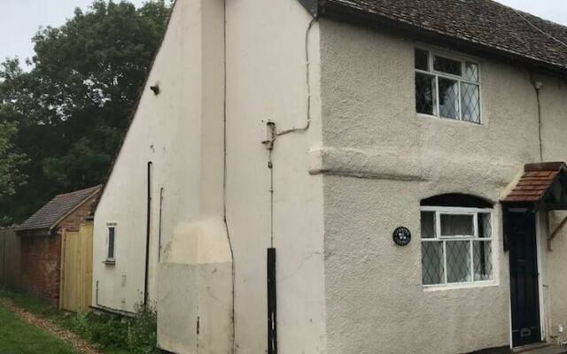 Village Period Cottage Next to a Idyllic Stream