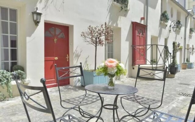 Hôtel Suites Unic Renoir Saint Germain