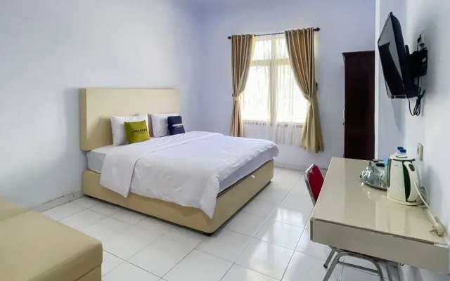 Urbanview Hotel Grand Seven One Kota