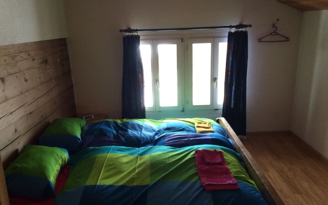Swiss vYntage Chalets - 300 Year Old Swiss Chalet – Guest Rooms – Saxeten