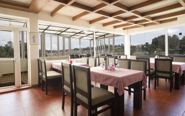 Fabhotel Sholas Residency I