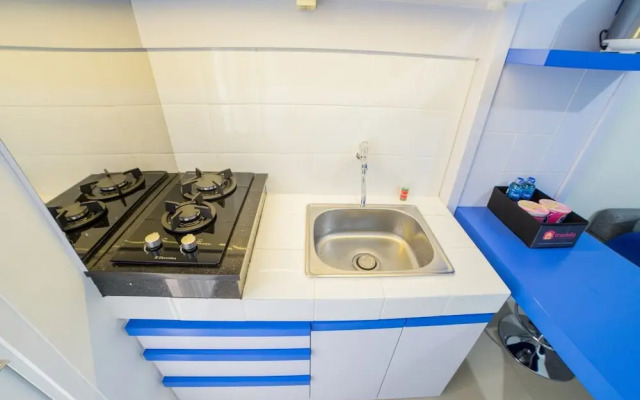 Cozy Apartment at Parahyangan Residence with Direct Access to Swimming Pool