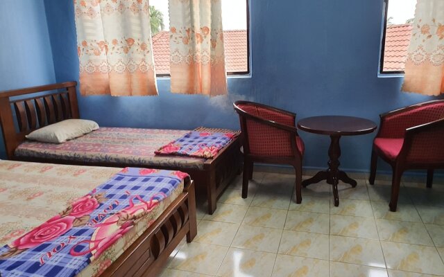 Spot On 89920 Muwaffaq Inn