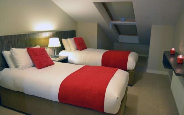 Carrick Plaza Suites & Apartments