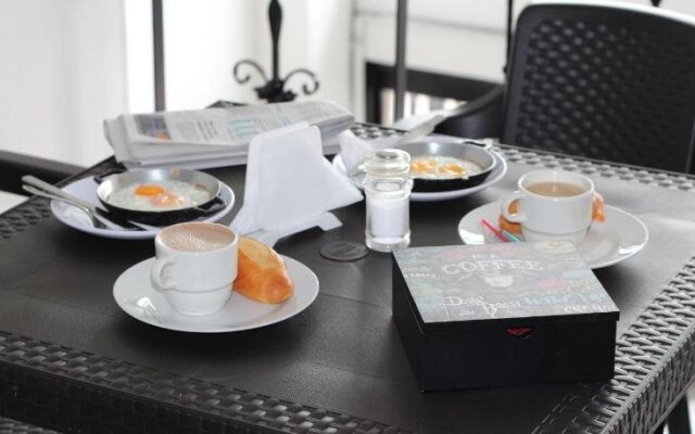 Ayenda 1030 Elegant Suites