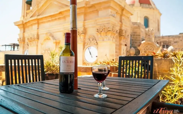 A Pretty Duplex Apartment in a Gozo Village Square