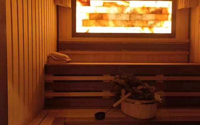 Log house with a Russian wood-burning sauna