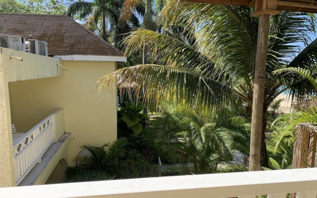 King Suite at Oceanview Resort in Jamaica - Enjoy 7 Miles Of White Sand Beach! 1 Bedroom Villa by Redawning