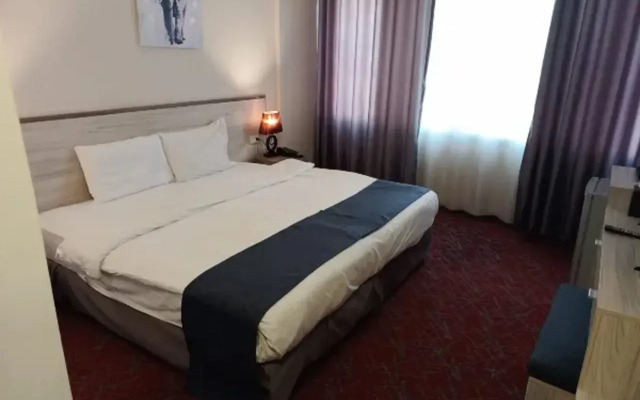 The Signature Hotel