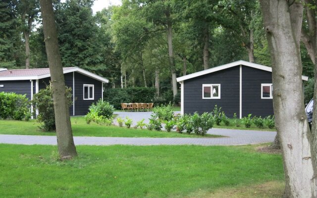 Nice house with a garden, surrounded by forest