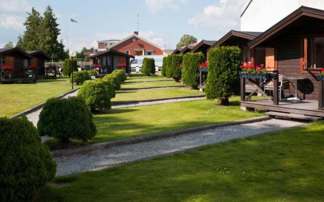 Milano Garden - City Bungalow Hotell, i gränssnittet till Kullabygdens pärlor