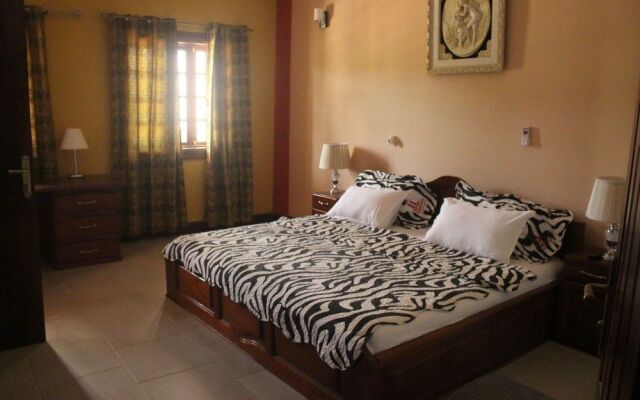 Oguaa Apartments & Lodging