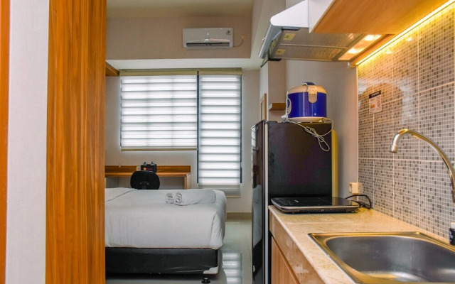 Nice And Cozy Studio At Evenciio Apartment