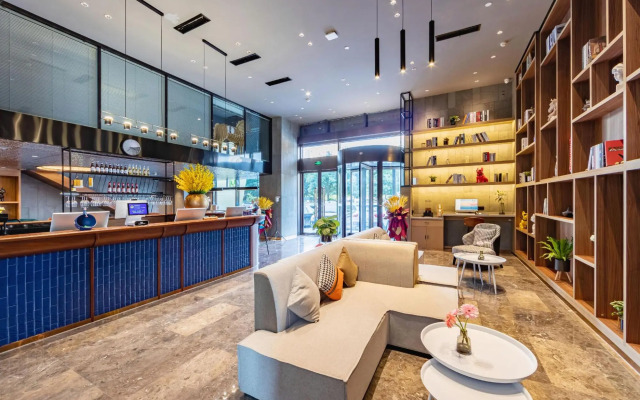 Ginza Jiayue Select Hotel (Qihe Wanda Plaza Spring City Oulebao)