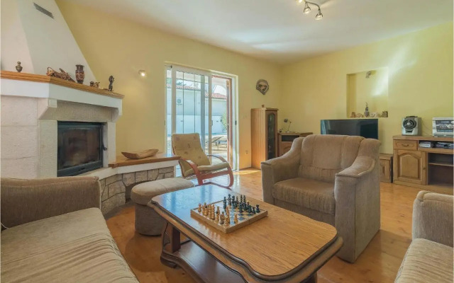 Two-Bedroom Holiday home Jezera with a Fireplace 05