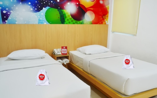 Nida Rooms Tampan Universitas Riau HR Subrantas at Mona Plaza Hotel – Guest Rooms – Pekanbaru