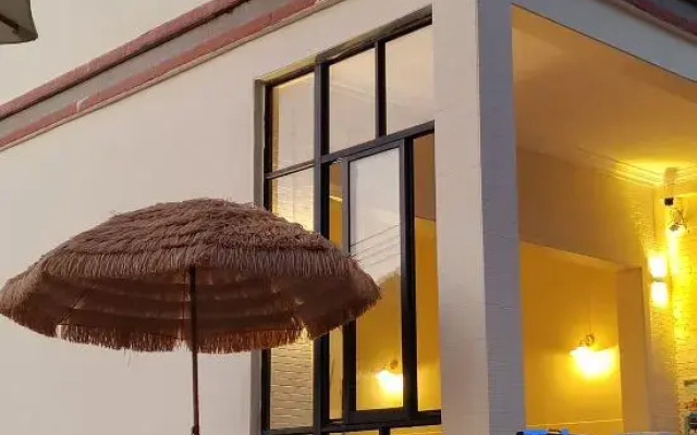 Wanning Riyue Bay Yiye Xiangcun Vacation Apartment