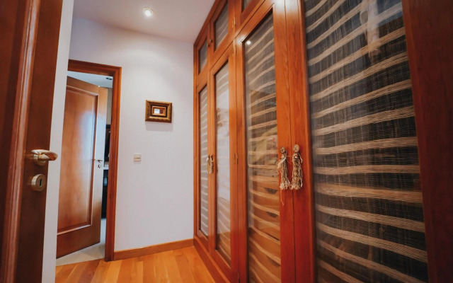 Villa con piscina a pie de playa