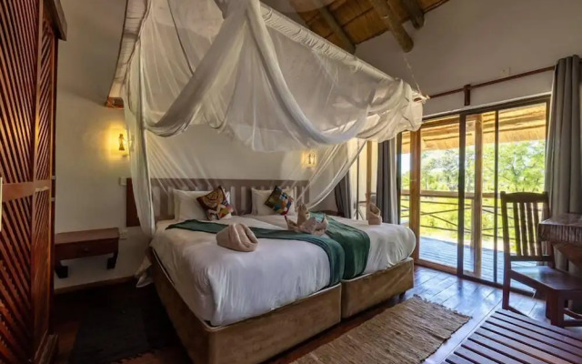 Chobe Mopani Forest Lodge & Camp site