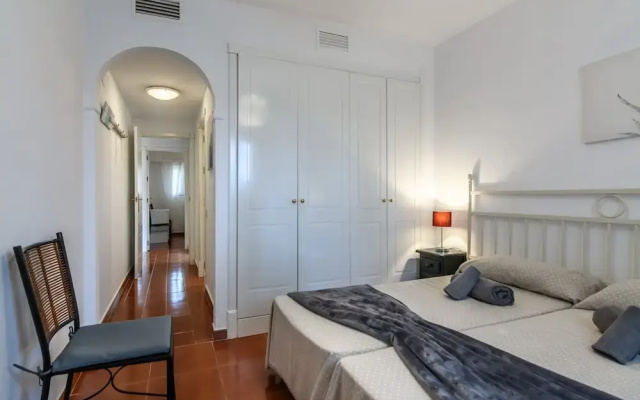Golf & Riverside Apartment in Isla Canela