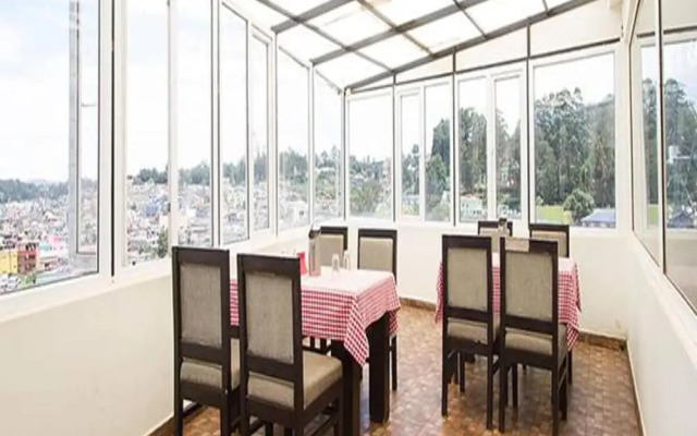 FabHotel Sholas Residency