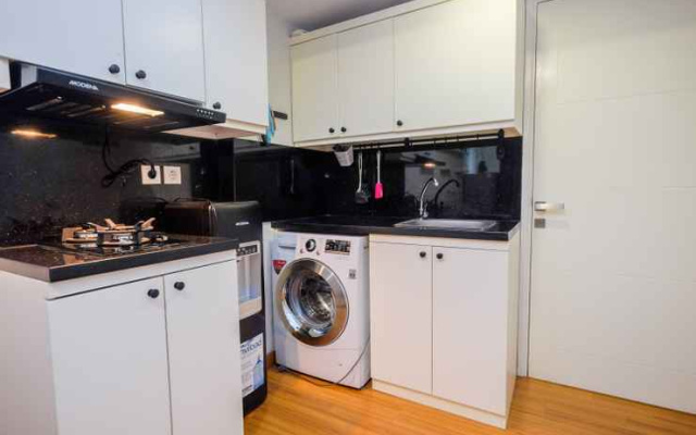 Homey 2BR with Pool View Apartment @ Springlake Summarecon By Travelio