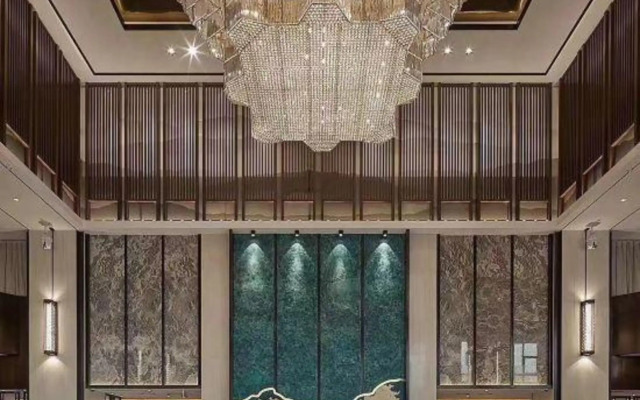 Xinzheng Xingangwanhua Hotel