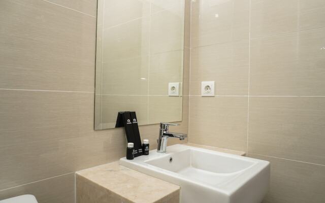 Minimalist Studio Room at Puri Mansion Apartment