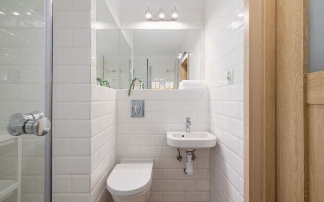 Grey Apartment in Katowice by Renters