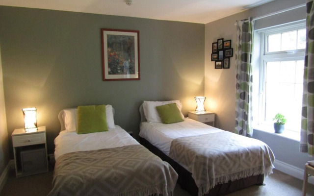 The Rose Garden Bed & Breakfast and Cafe
