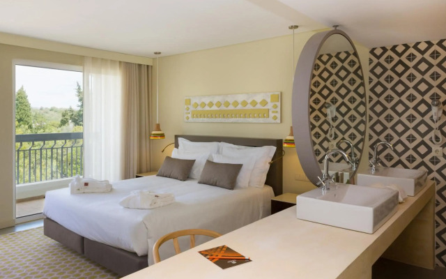 Ozadi Tavira Hotel
