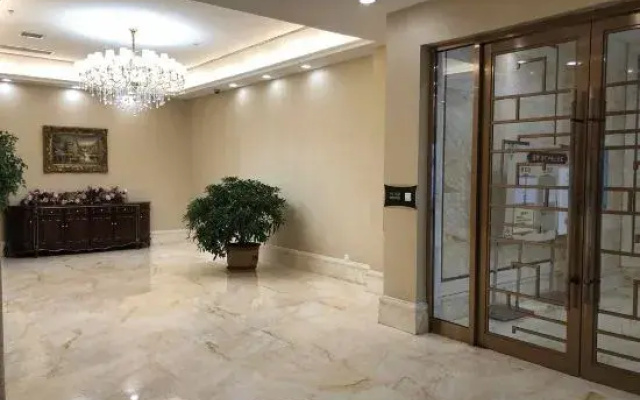 Ganghui Four Seasons Hotel Apartment (Dalian Railway Station Zhongshan Square)