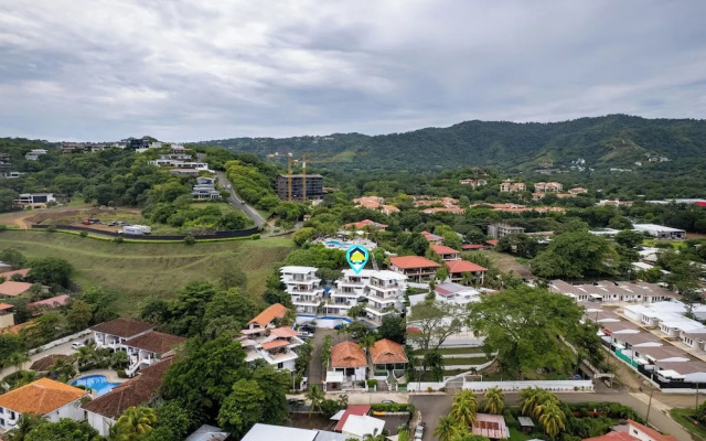 Modern Top-Floor Condo with Panoramic Views and Community Pool
