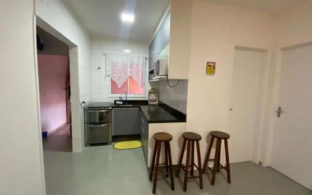 Casa em Bertioga condomínio 250 metros da praia