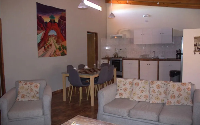 Peumayen Atacama / Hostal & Cabaña