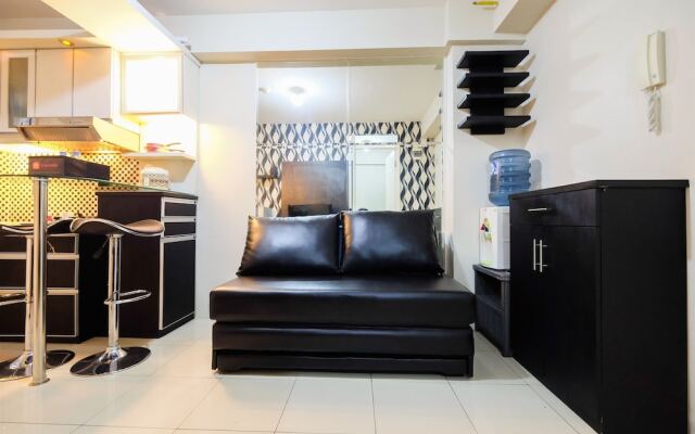 Monochrome Style 2 Bedrooms at Kalibata City Apartment By Travelio