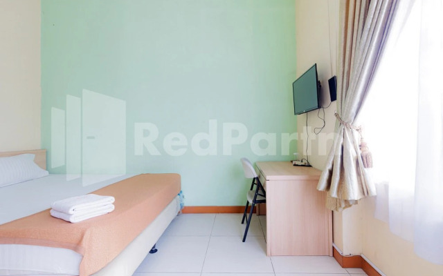 Wisma Anggrek Syariah Mitra Reddoorz