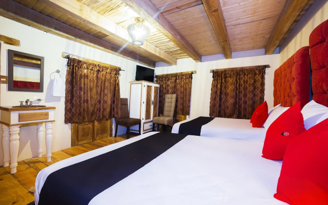 Capital O Cabañas El Rincón