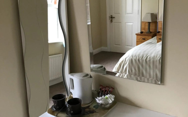 Derreen Tighue House