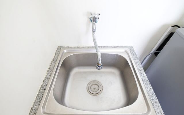 Furnished Studio with Comfortable Design Green Pramuka Apartment