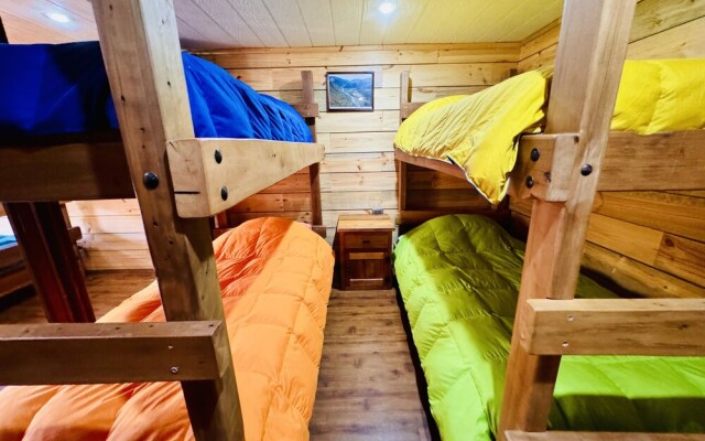 Cabañas entre montañas con tinajas calientes