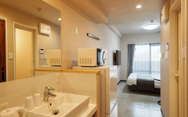 New Normal Hotel in MATSUYAMA – Guest Rooms – Naha