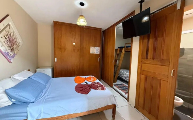 Quarto 100m da praia Pereque