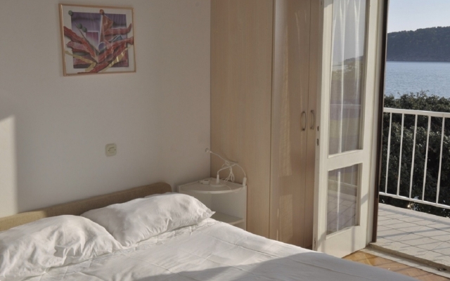 Apartment Petar - 6m from the sea: A1 Barbat, Island Rab