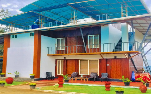 SaffronStays Cholamala
