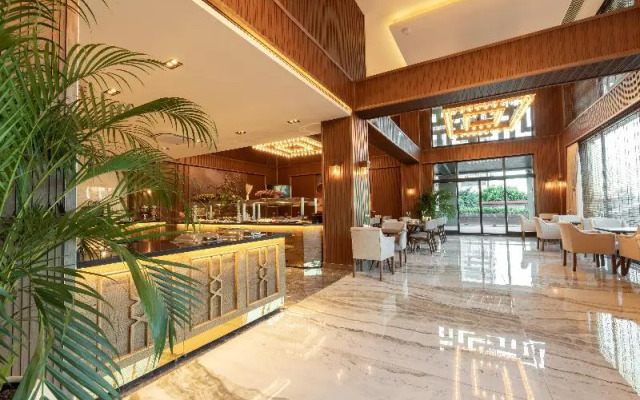 By The Marina Hotel