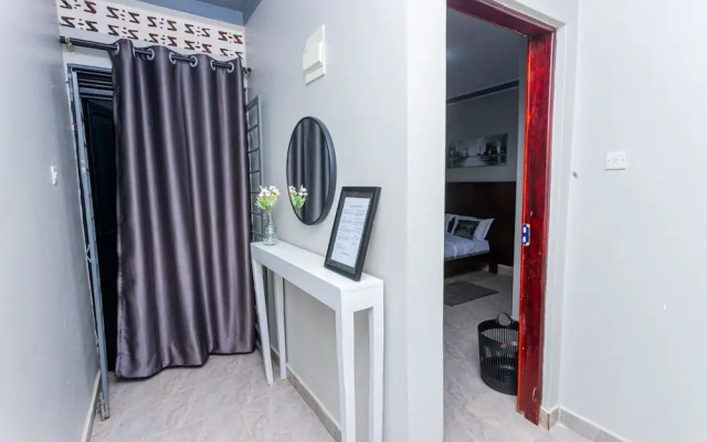 The Den Soroti White